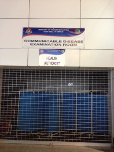 Infection control station at the airport in Kuala Lumpur.