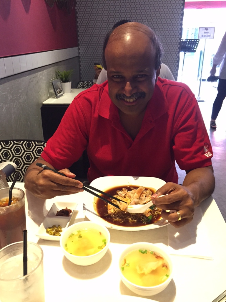 Prof. Paul Tambyah having chicken ipoh hor fun at a well known Holland Village restaurant.